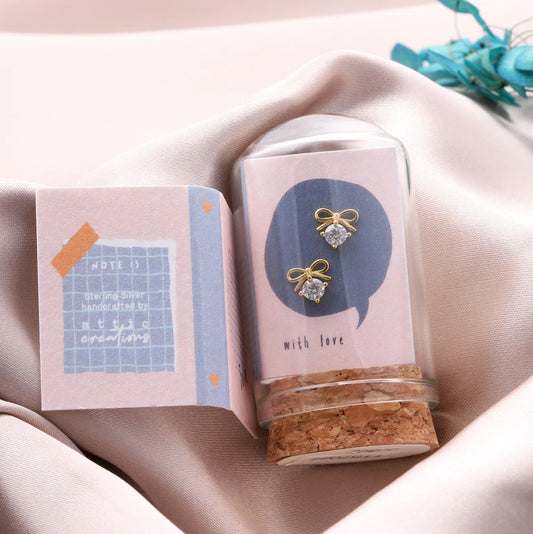 Attic Creations Little Note Bow And Crystal Heart Earrings Gold