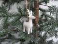 White ceramic reindeer tree dec with red nose