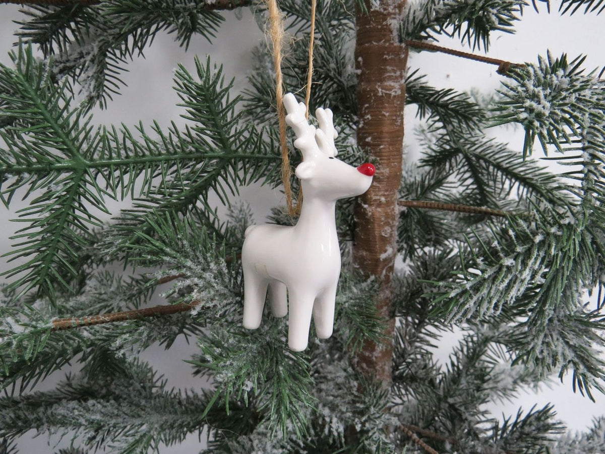 White ceramic reindeer tree dec with red nose